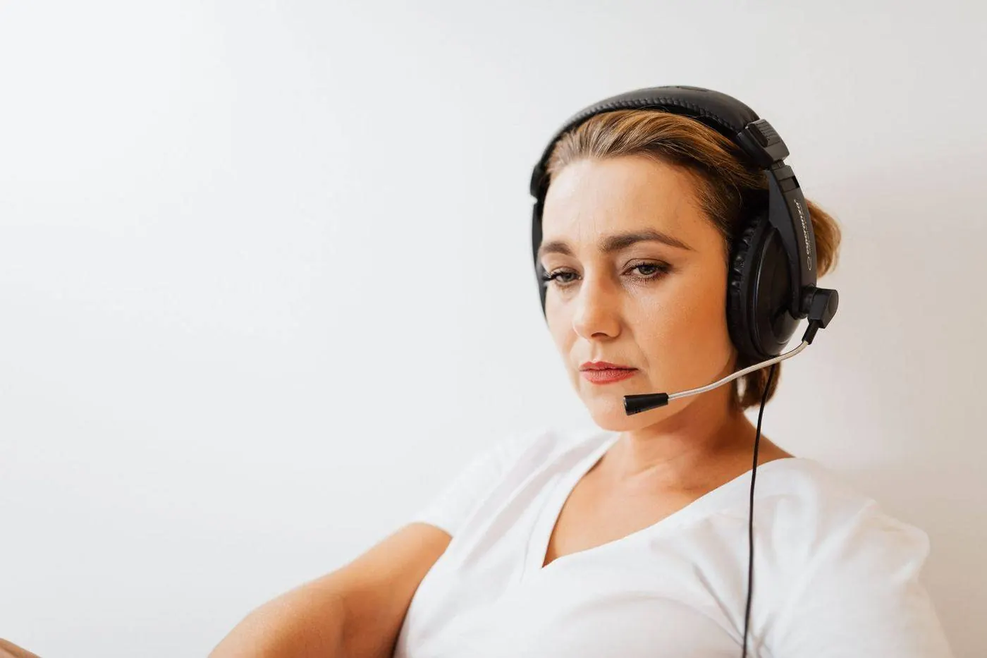 Friendly representative taking a call about a roof leak