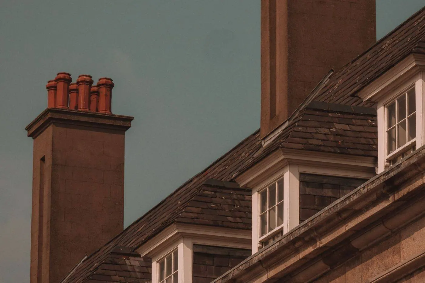 Close-up of chimney flashing, a common roof leak source